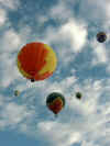 Colorful Balloons Against the White Clouds